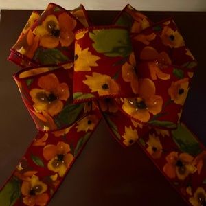 Burgundy bow with shades of dark orange,beige, brown and green